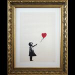 Rubano stampa Ragazza con Palloncino di Banksy incriminate 2 persone