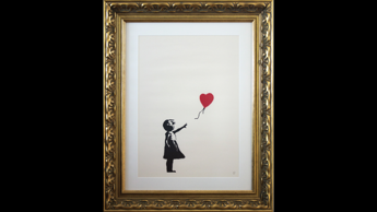 Rubano stampa Ragazza con Palloncino di Banksy incriminate 2 persone