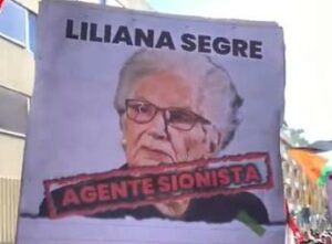 Segre agente sionista a corteo pro Pal a Milano cartelli contro la senatrice a vita